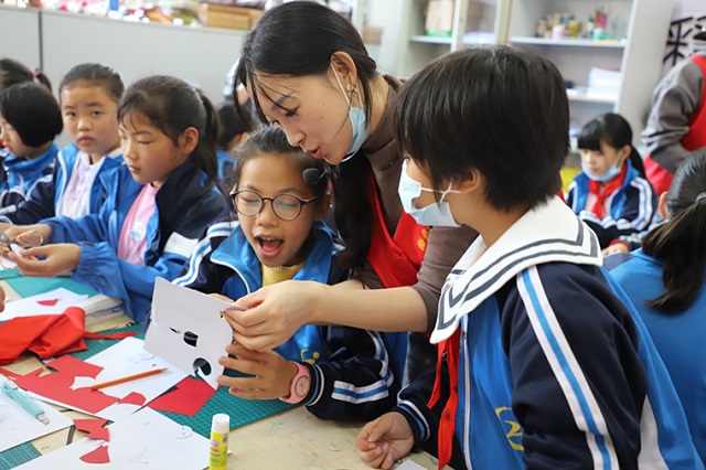 牽手留守兒童，傳承中華優(yōu)秀傳統(tǒng)文化 